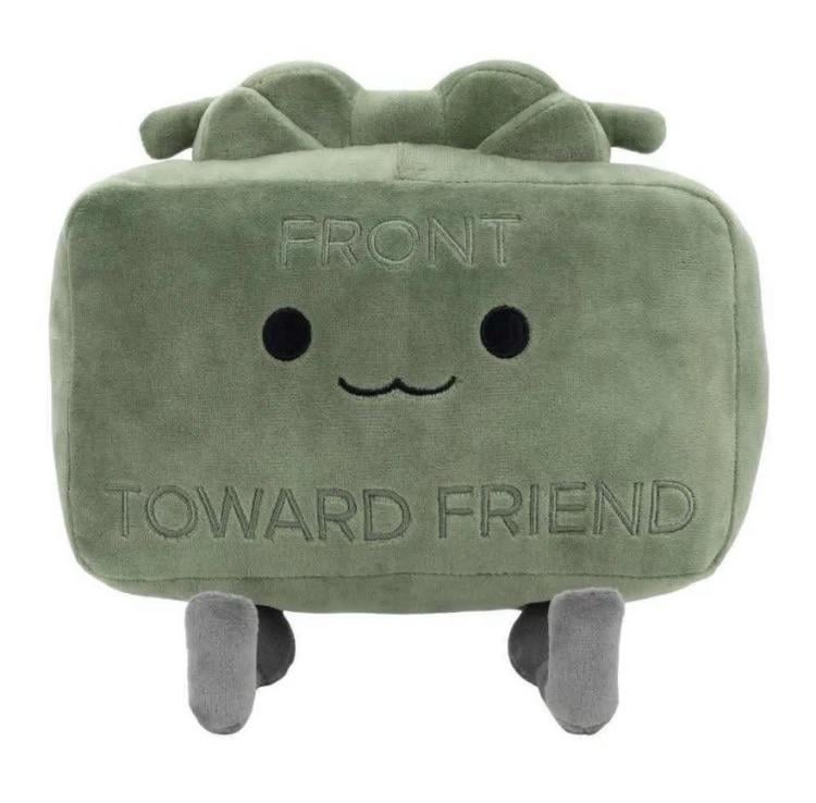 A picture of a claymore plush toy with the text "FRONT TOWARD FRIEND".