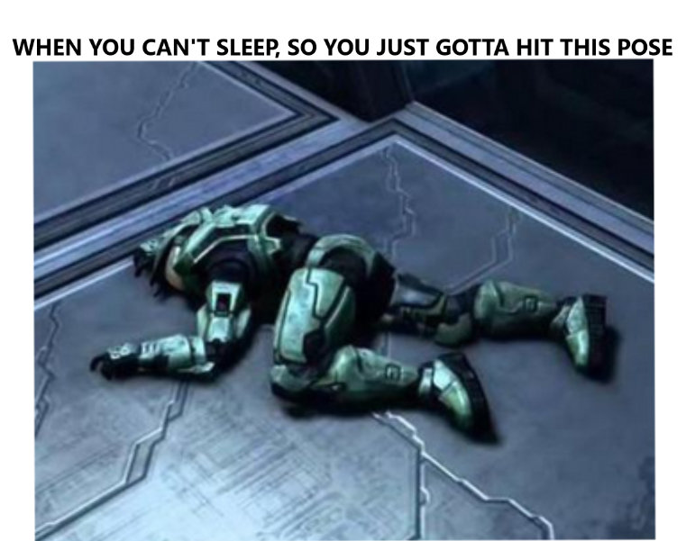 master chief laying on the floor in a funny position